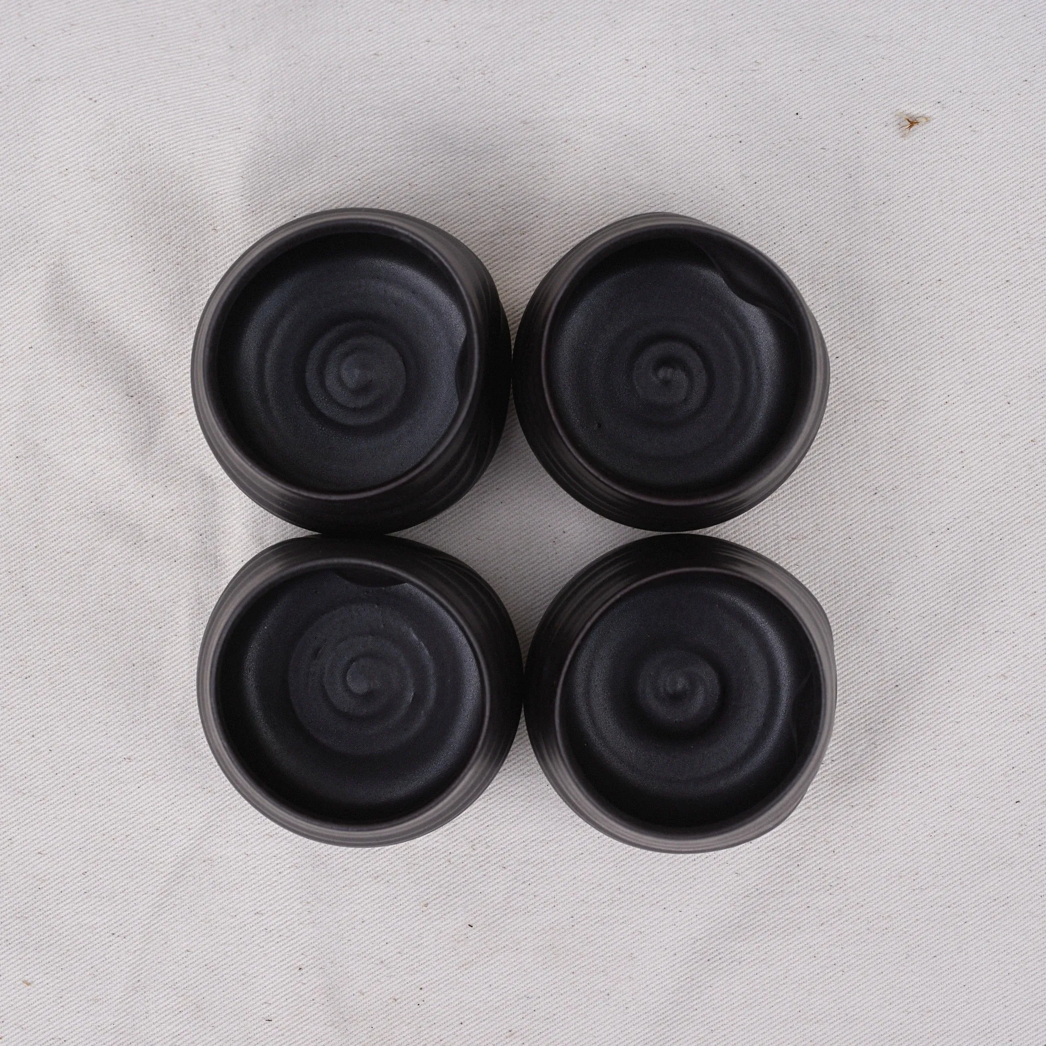 Ceramic sipping cup, black (set of 4)